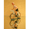 Figurine cycliste : maillot à pois en danseuse